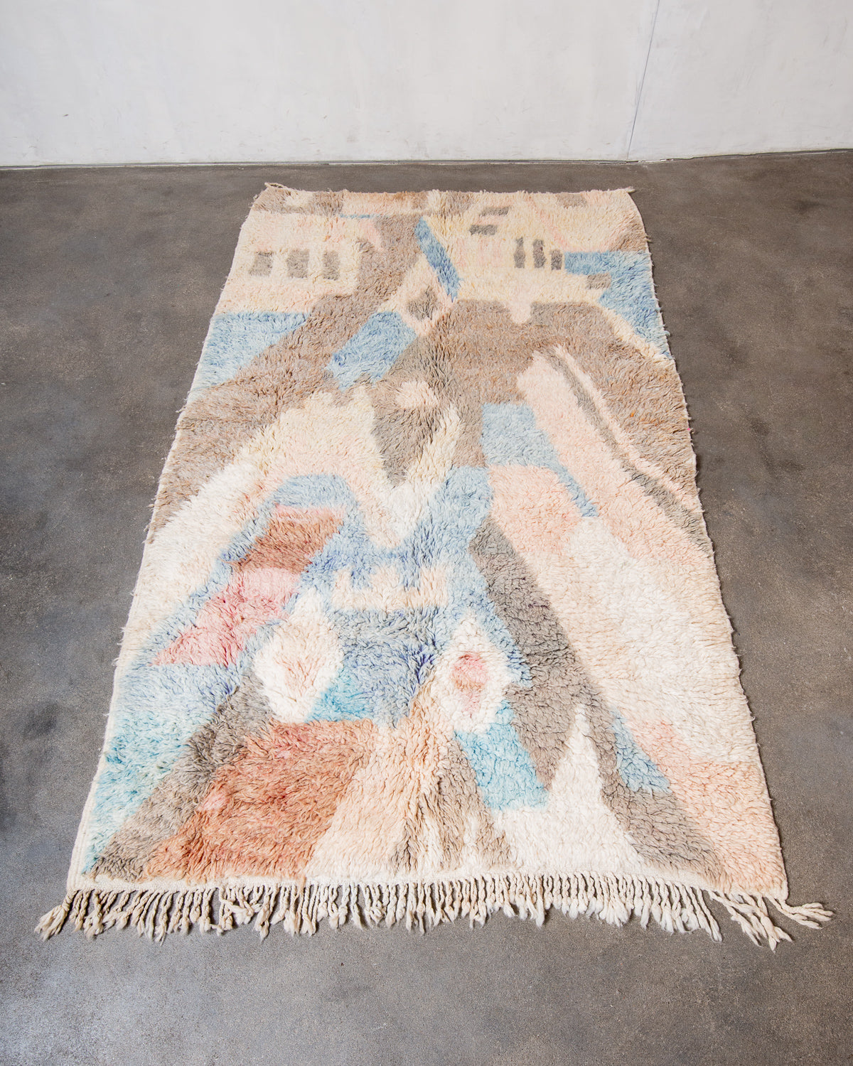 Modern, designer, handcrafted Berber rug from Morocco. Vintage carpet with beautiful colours and patterns and fluffy texture.